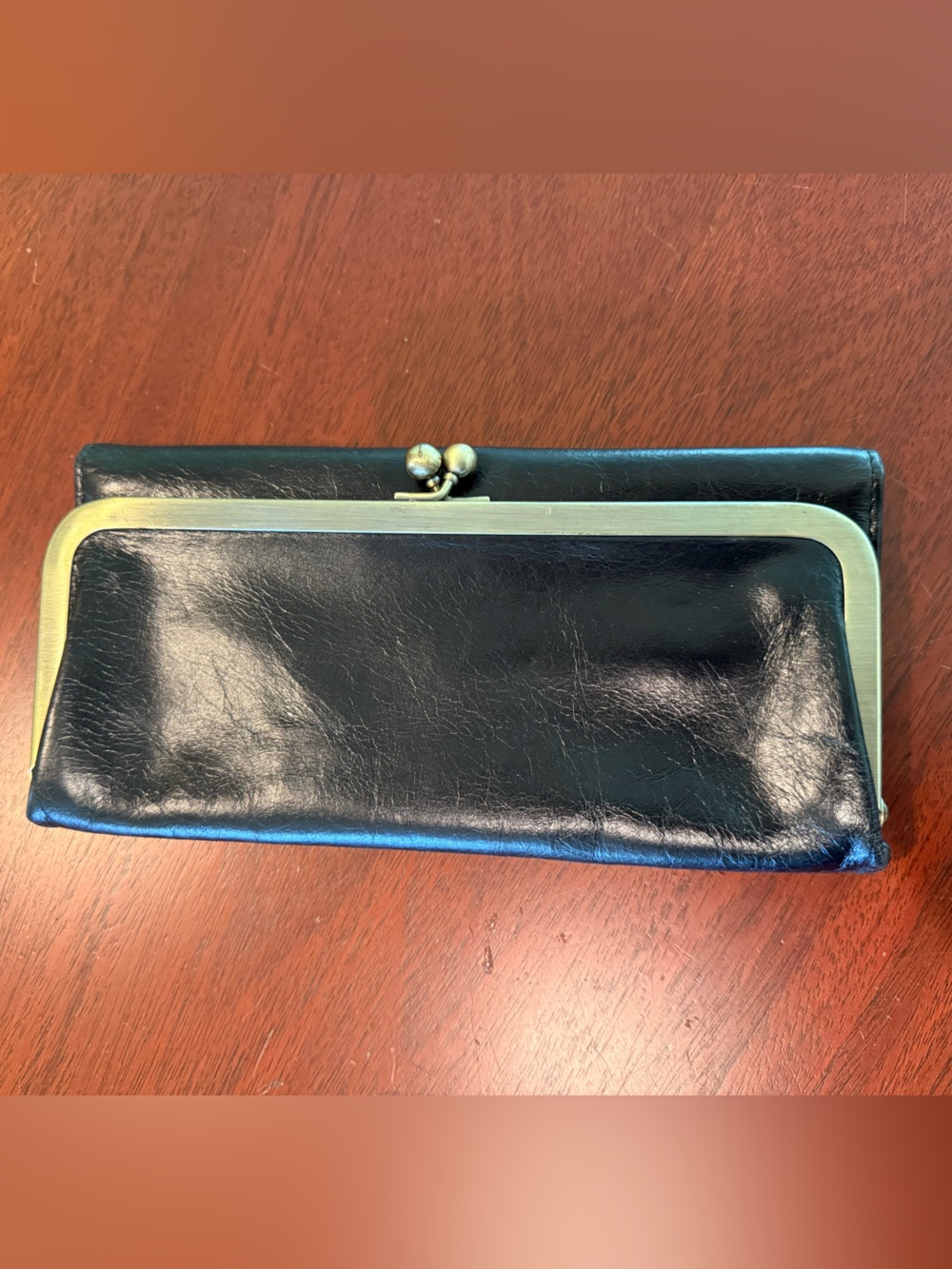 HOBO Black Leather Kiss-Lock Wallet with Brass Frame